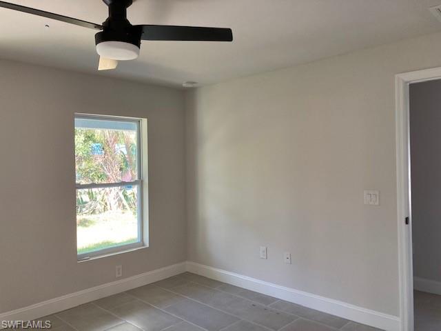 3838 Kelly Street Fort Myers, FL 33901 - Photo 12 of 15 an empty room with a window