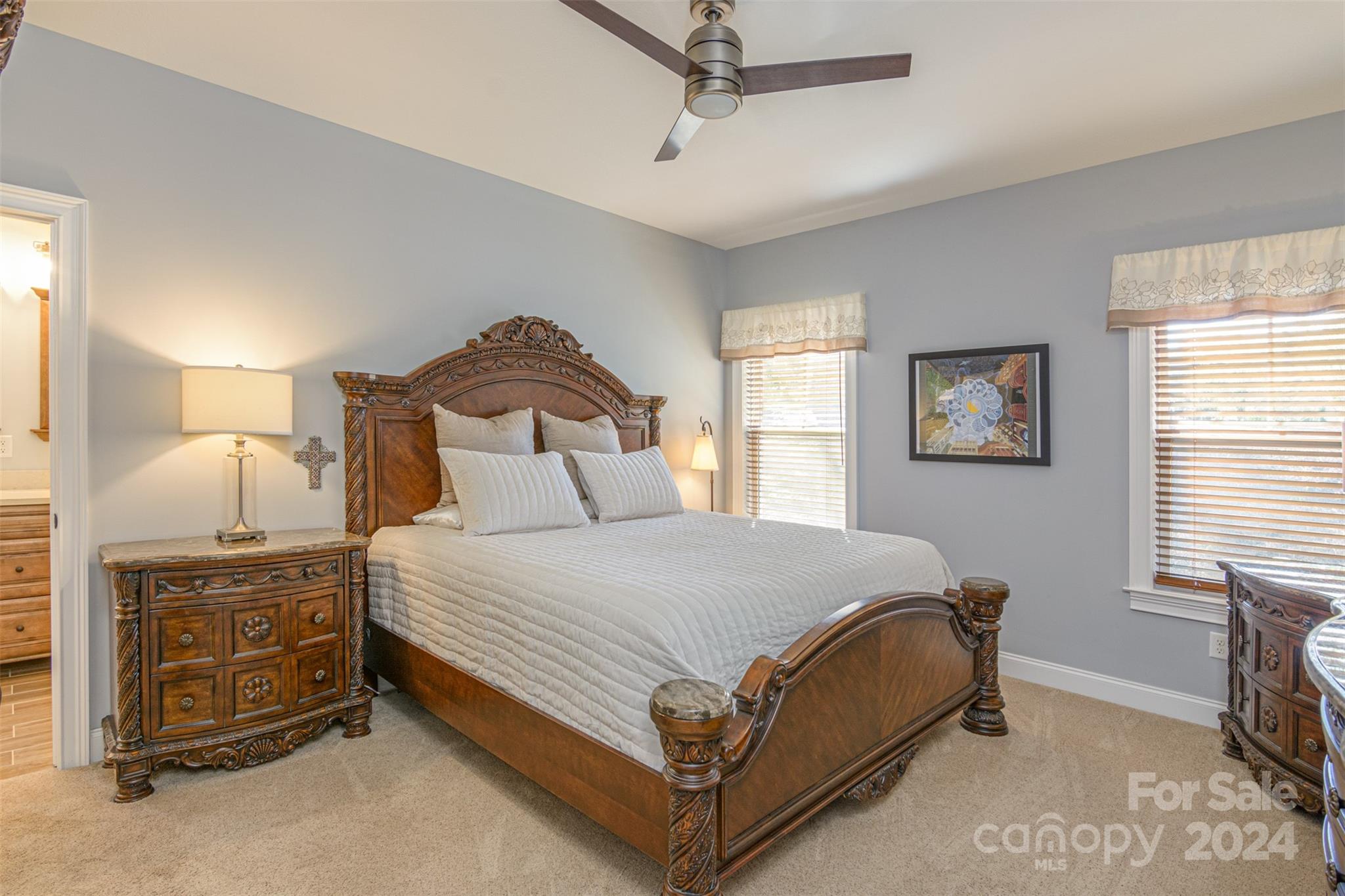 47 Asher Lane Arden, NC 28704 - Photo 16 of 34 a bedroom with a bed and a tv