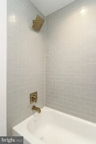a bathroom with a sink and a shower
