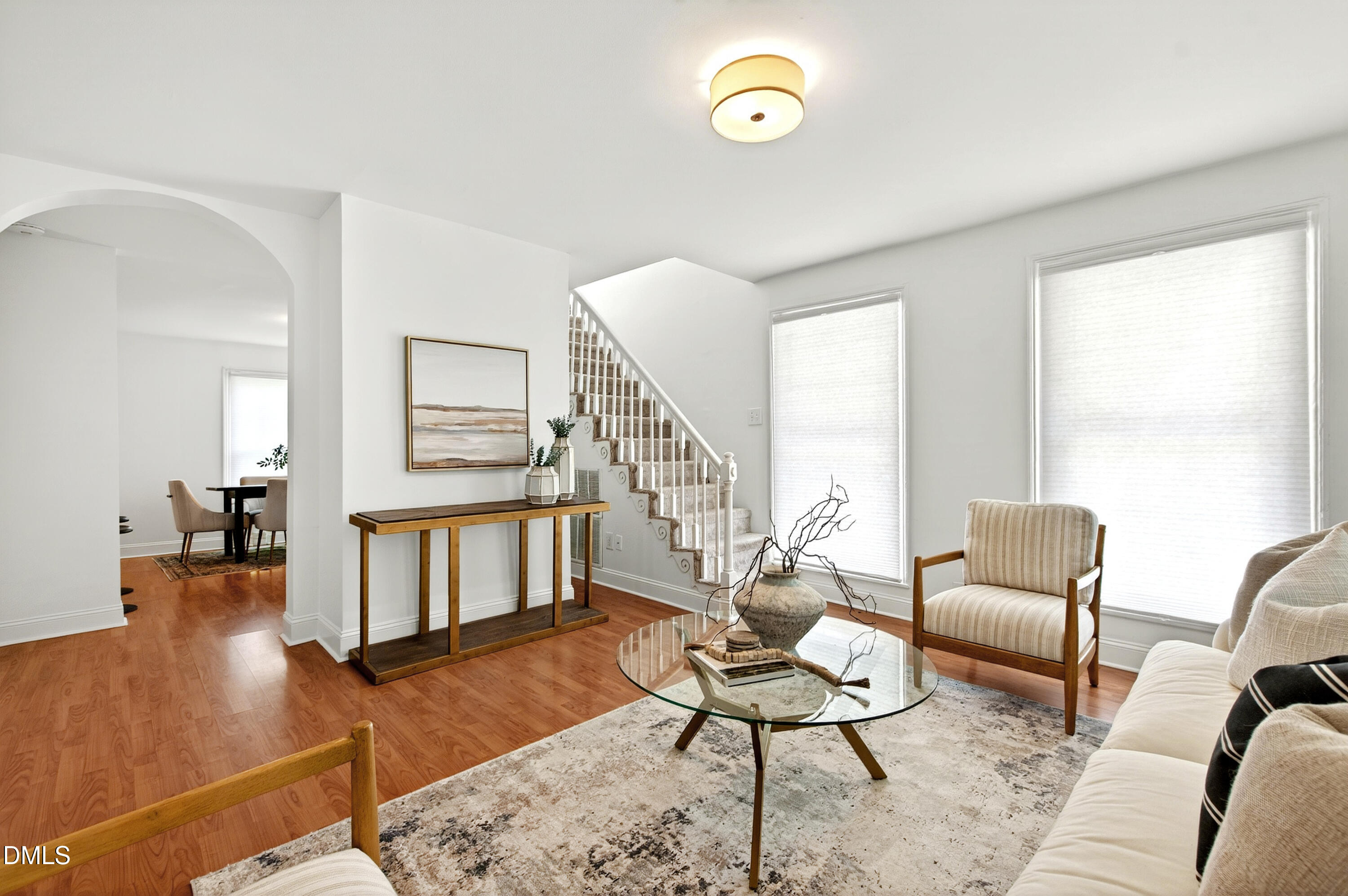 913 Washington Street Durham, NC 27701 - Photo 11 of 37 a living room with furniture and a wooden floor