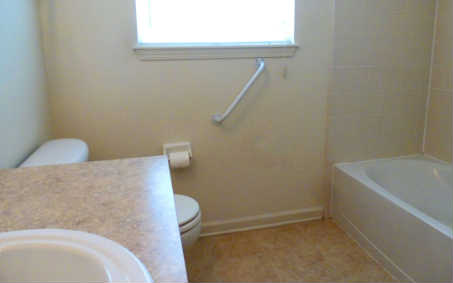 96050 Starlight Lane Yulee, FL 32097 - Photo 12 of 24 a bathroom with a bathtub