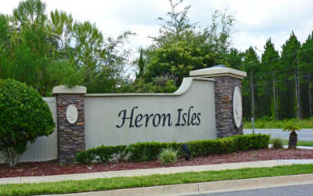 96050 Starlight Lane Yulee, FL 32097 - Photo 14 of 24 a sign on the side of the house