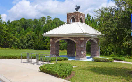 96050 Starlight Lane Yulee, FL 32097 - Photo 22 of 24 a front view of a house with garden