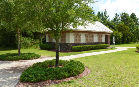 96050 Starlight Lane Yulee, FL 32097 - Photo 23 of 24 a view of a house with a yard and large tree