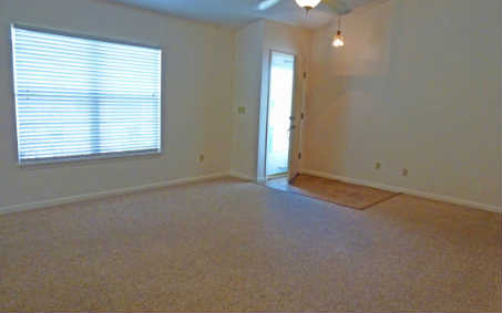 96050 Starlight Lane Yulee, FL 32097 - Photo 5 of 24 an empty room with windows