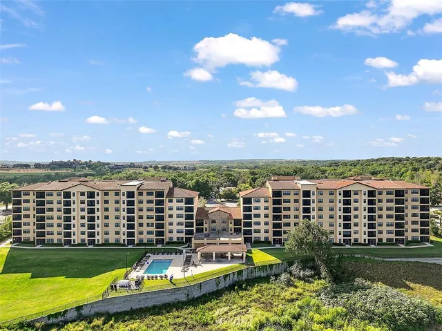 a view of a building with a garden