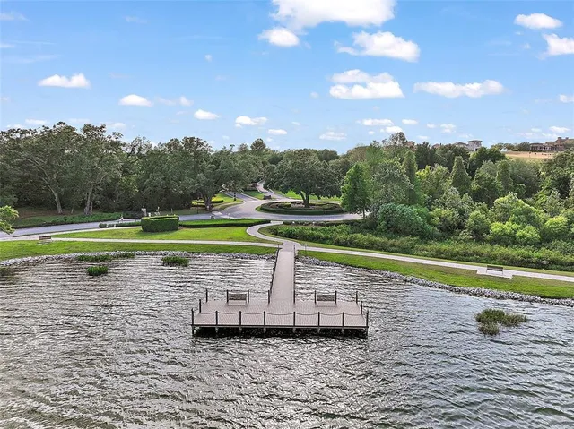 a view of a lake and a yard