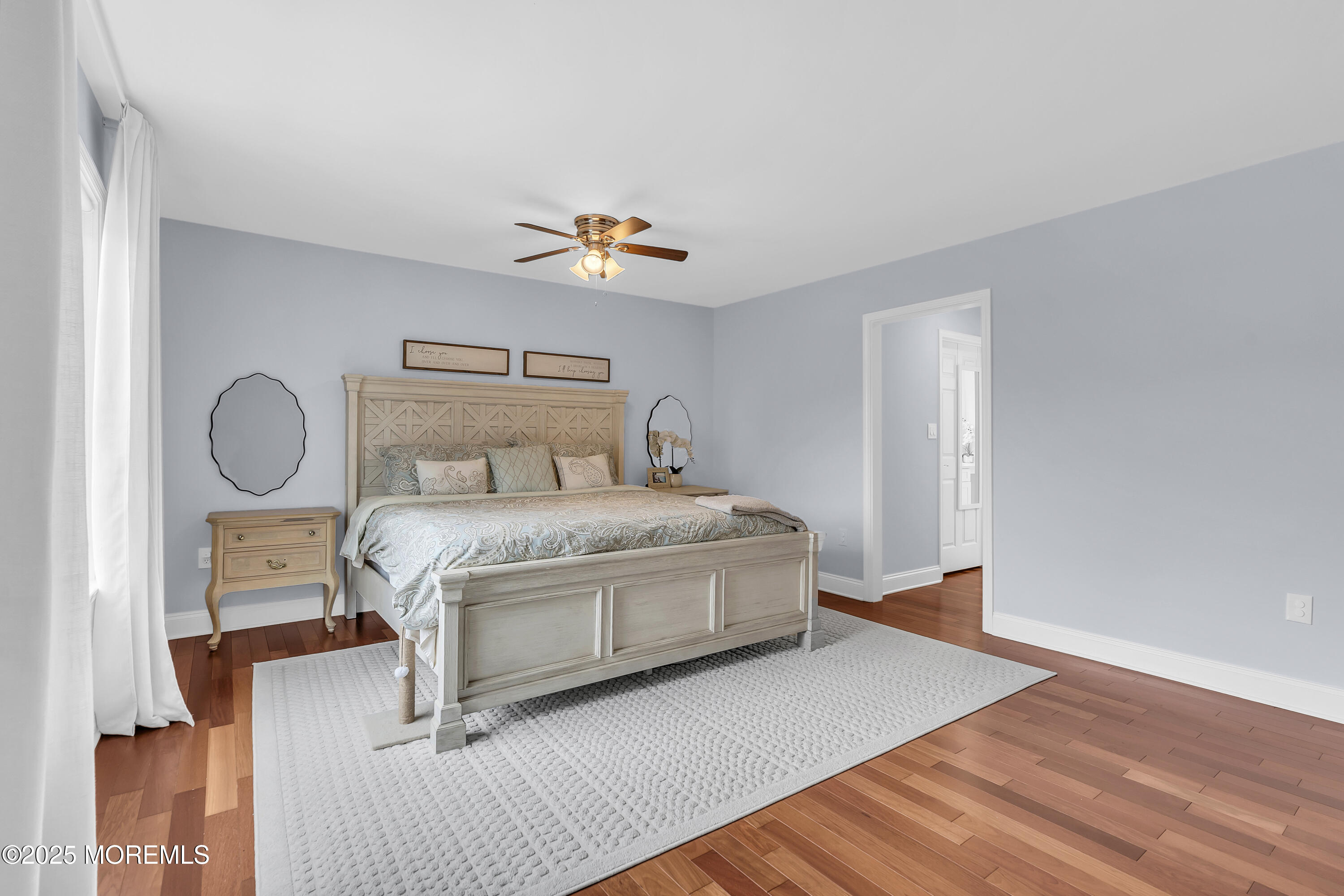 4 Rainbow Drive Howell, NJ 07731 - Photo 17 of 38 a bedroom with a bed and wooden floor