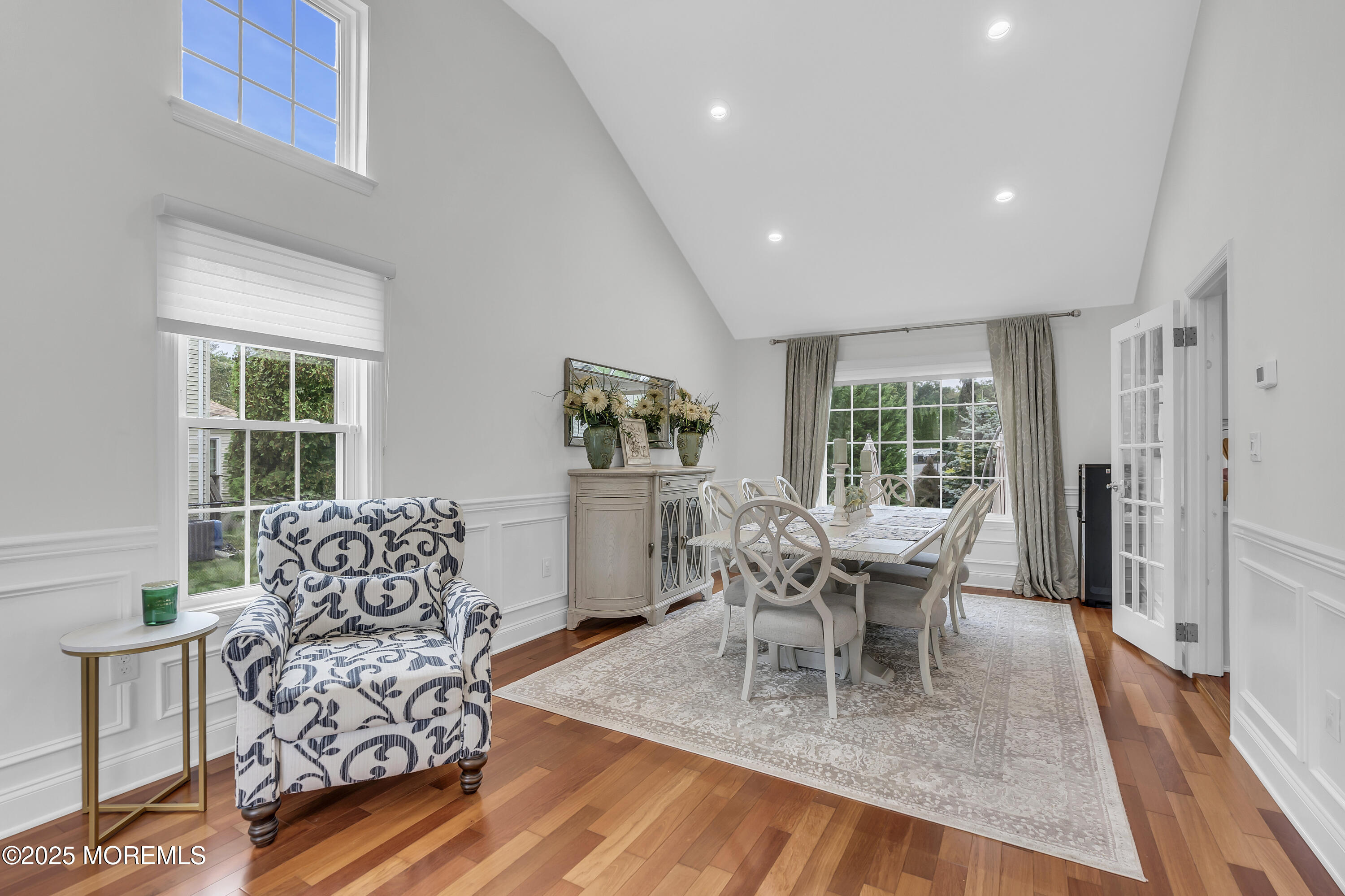 4 Rainbow Drive Howell, NJ 07731 - Photo 6 of 38 a dining room with furniture a chandelier and wooden floor