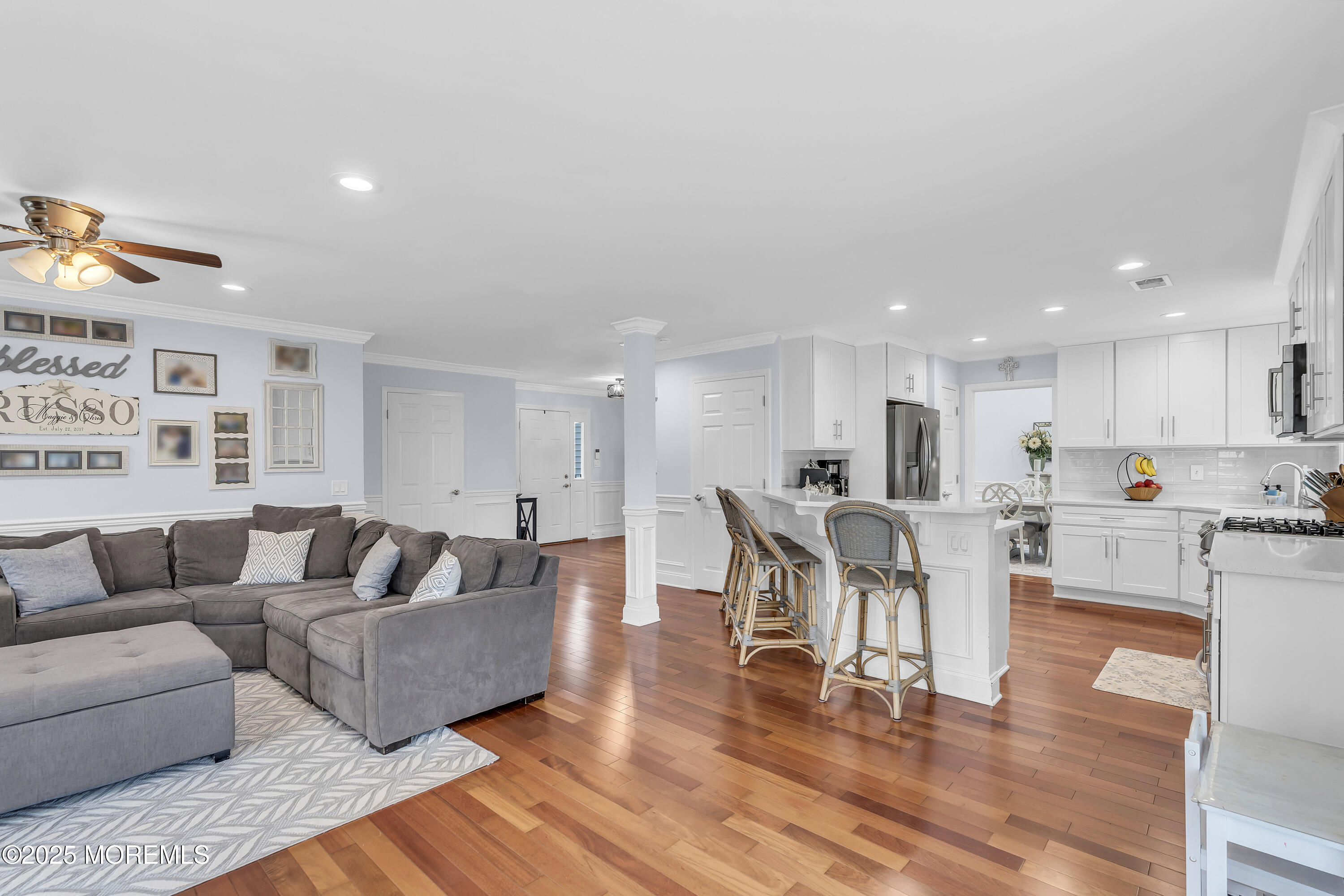 4 Rainbow Drive Howell, NJ 07731 - Photo 8 of 38 a living room with furniture and a wooden floor
