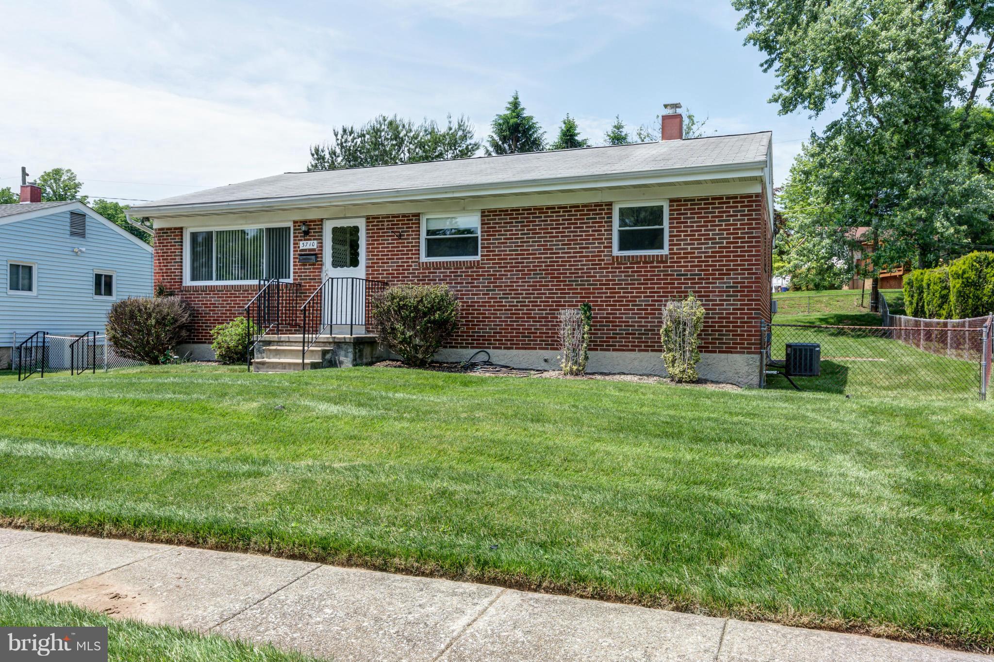 3710 Parkfield Road Baltimore, MD 21244 - Photo 2 of 28 a front view of house with yard and green space