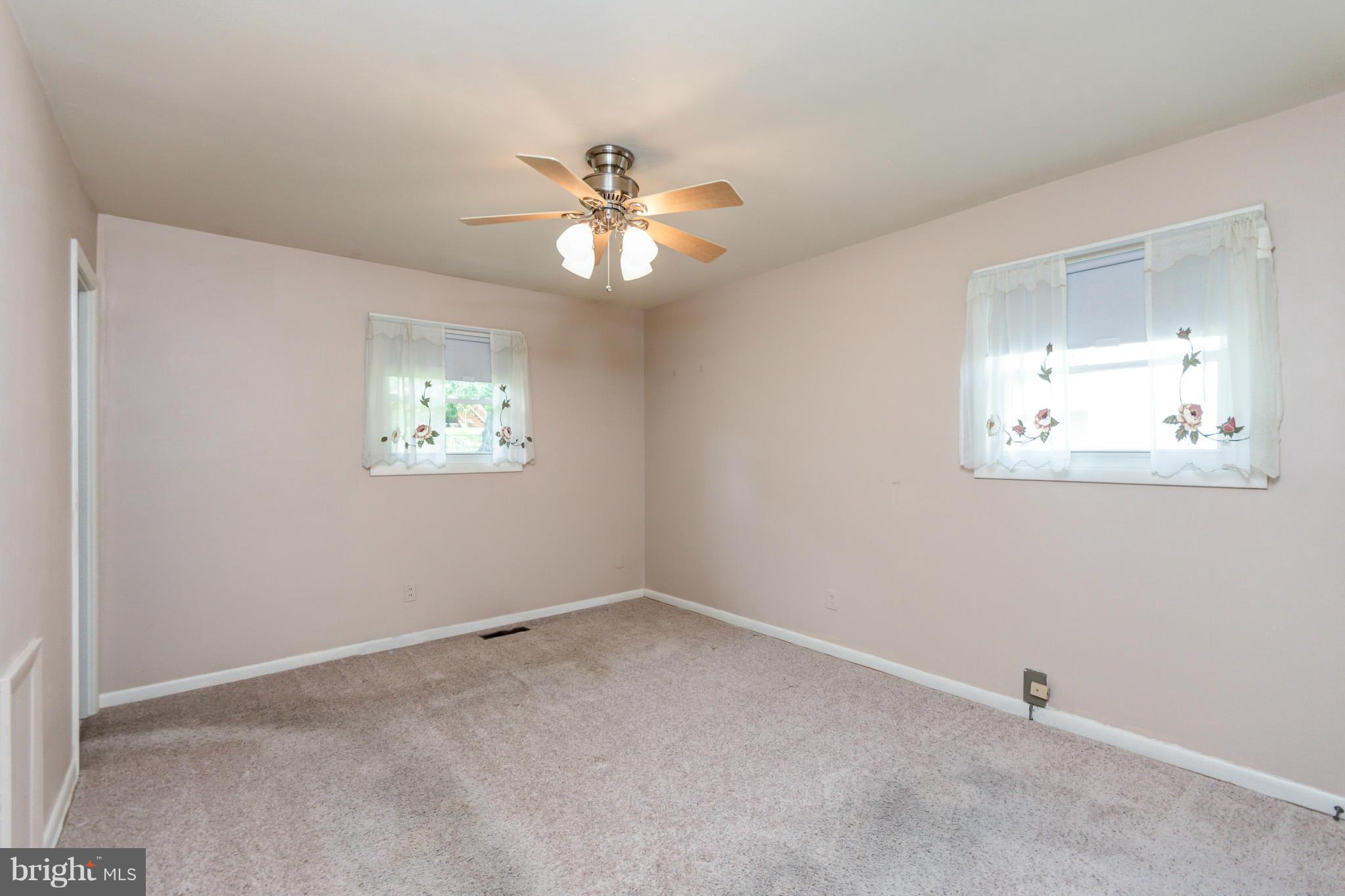 3710 Parkfield Road Baltimore, MD 21244 - Photo 16 of 28 a view of an empty room with a window