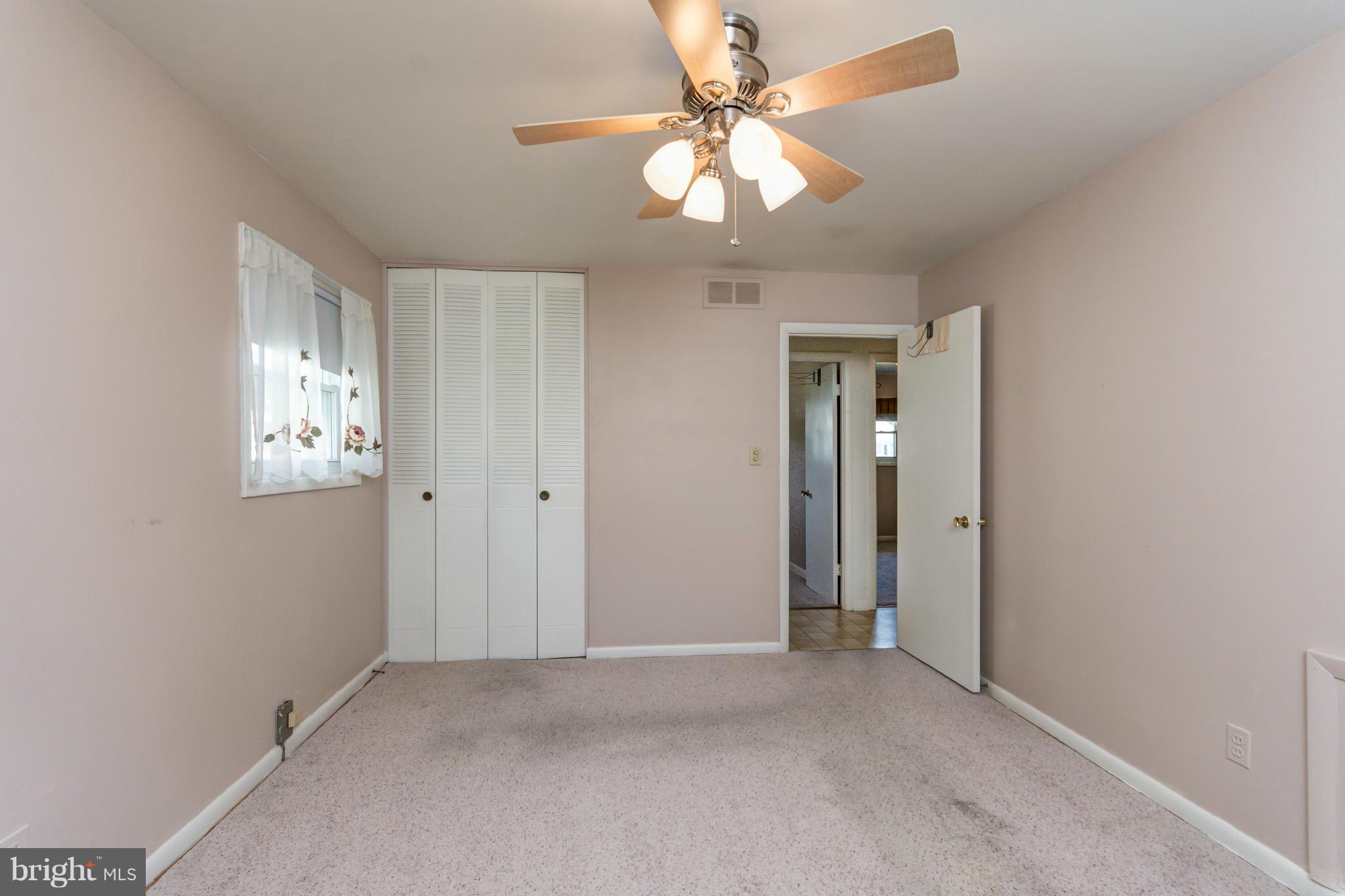 3710 Parkfield Road Baltimore, MD 21244 - Photo 17 of 28 a view of an empty room with a window