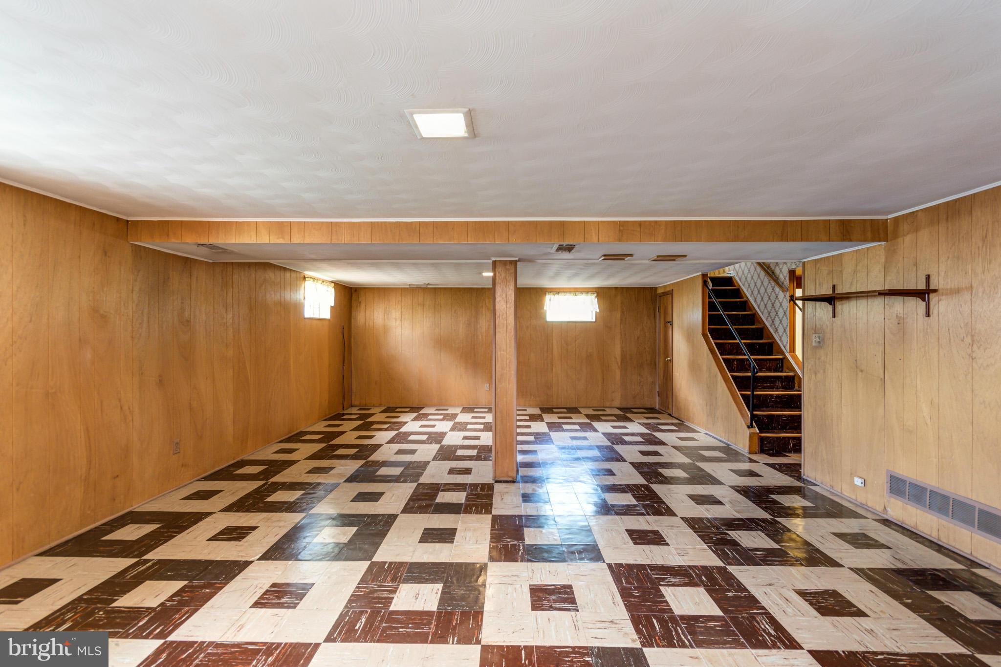 3710 Parkfield Road Baltimore, MD 21244 - Photo 22 of 28 a black and white checkered floor