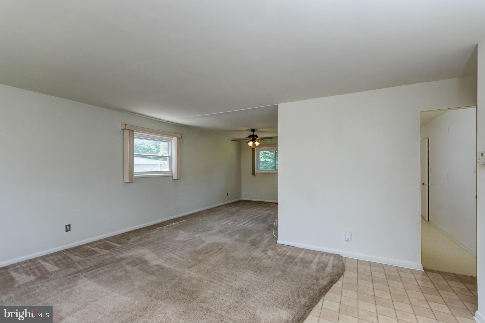3710 Parkfield Road Baltimore, MD 21244 - Photo 4 of 28 an empty room with windows