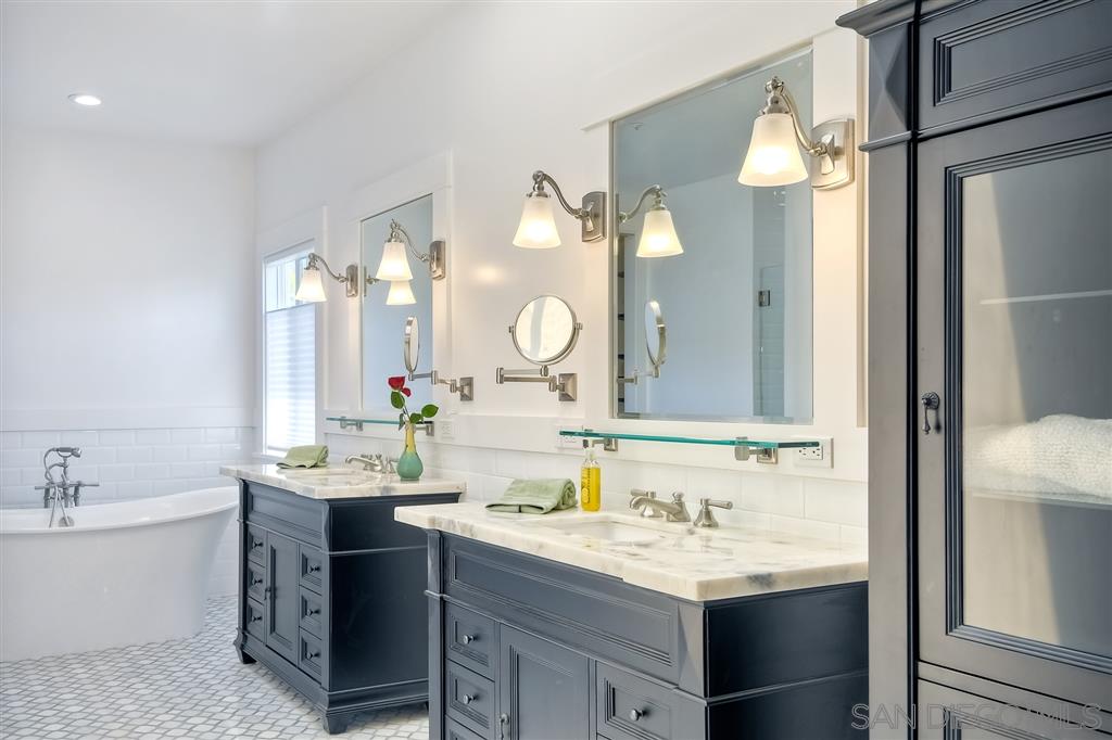 2727 MacKinnon Ranch Road Cardiff-by-the-Sea, CA 92007 - Photo 22 of 25 All bedrooms – closets- built-in shelving , Elfa metal Bathrooms - Carrera Marble Floors , subway tile throughout with custom glass shower enclosures (Master and 2nd bath)
