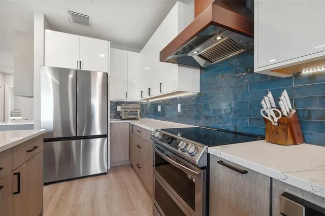 a view of a balcony with wooden floor