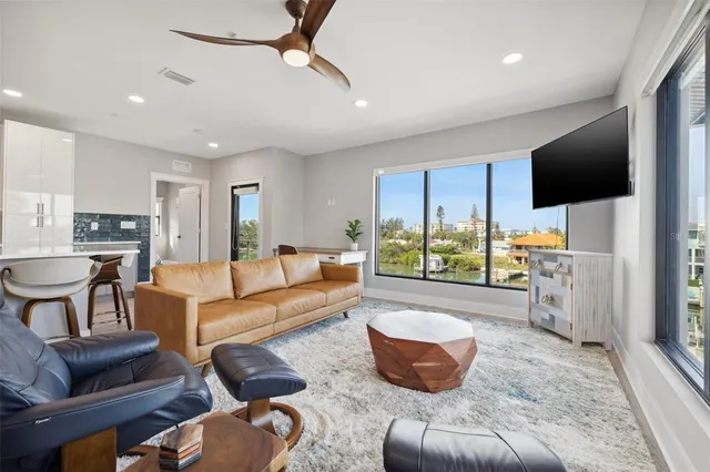 a bathroom with a tub a sink and mirror