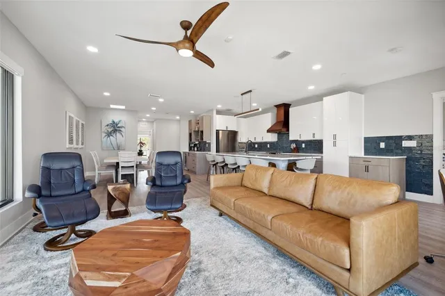 a bathroom with a double vanity sink mirror and shower