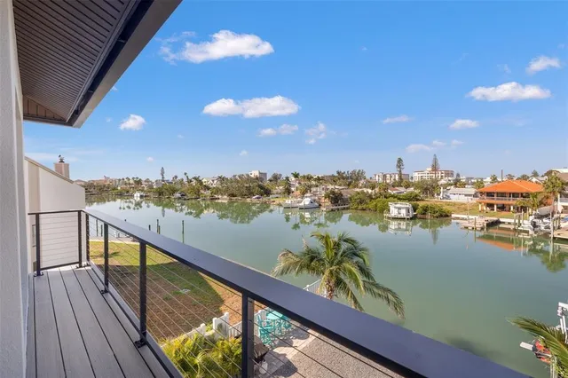 a view of walk in closet with wooden floor