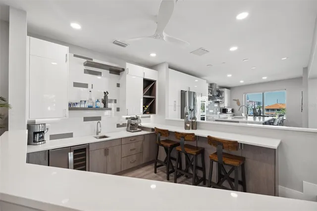 a bathroom with a bathtub and shower