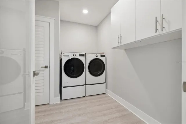 a view of a livingroom with furniture and a flat screen tv