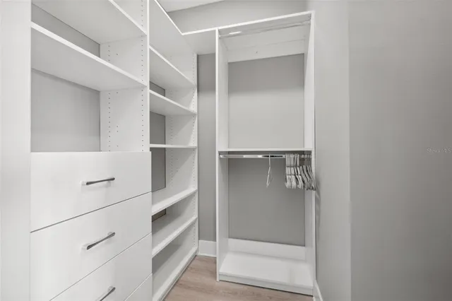 an aerial view of a city with ocean view