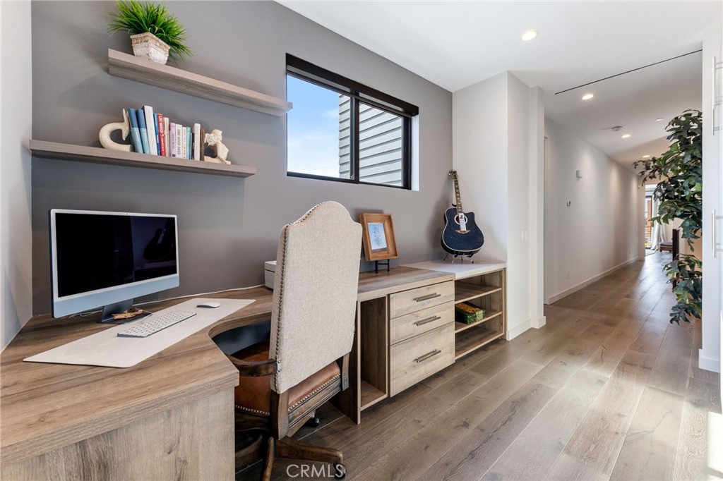 1002 Huntington Street Huntington Beach, CA 92648 - Photo 14 of 43 a view of workspace with furniture and window