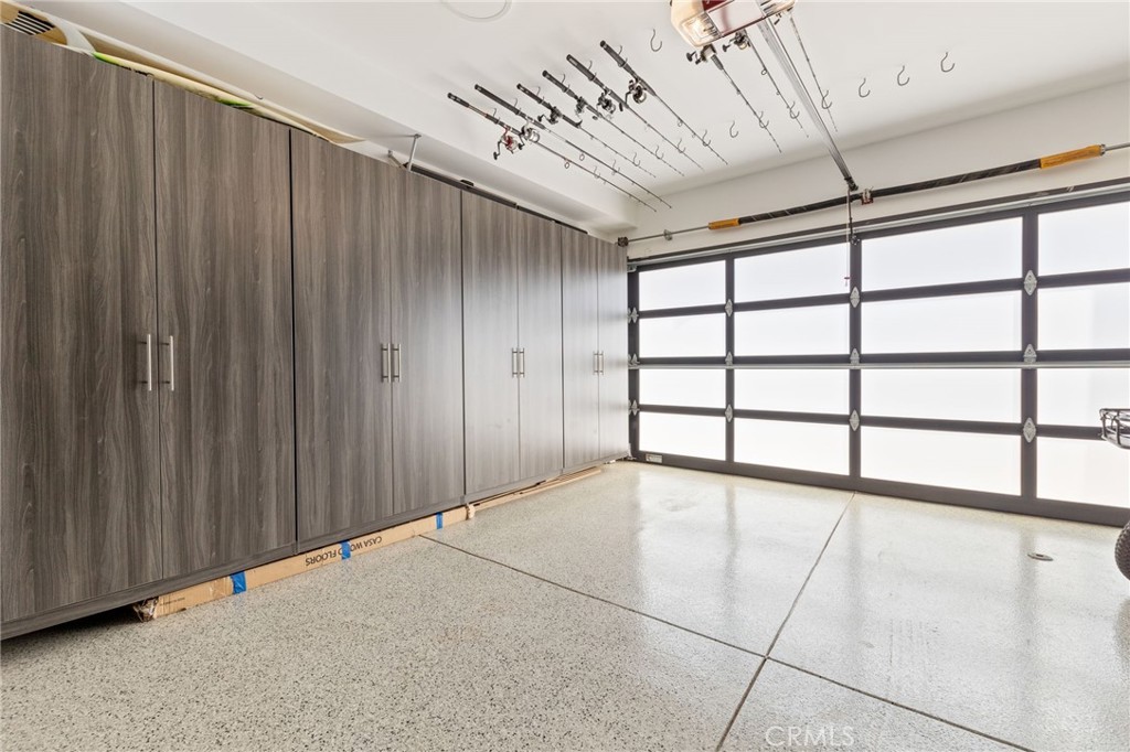 1002 Huntington Street Huntington Beach, CA 92648 - Photo 40 of 43 a view of a livingroom with a floor to ceiling window and carpet