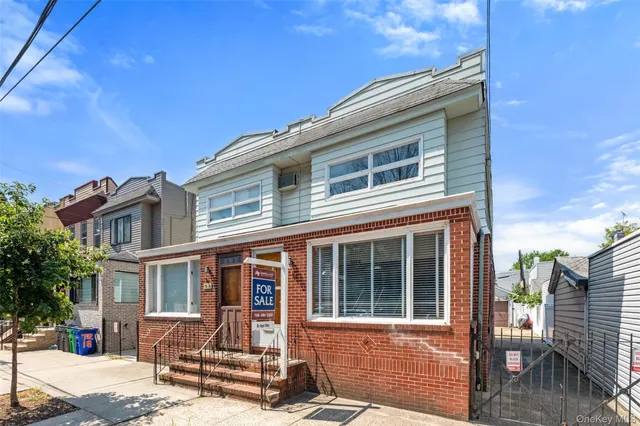 a front view of a house with a porch