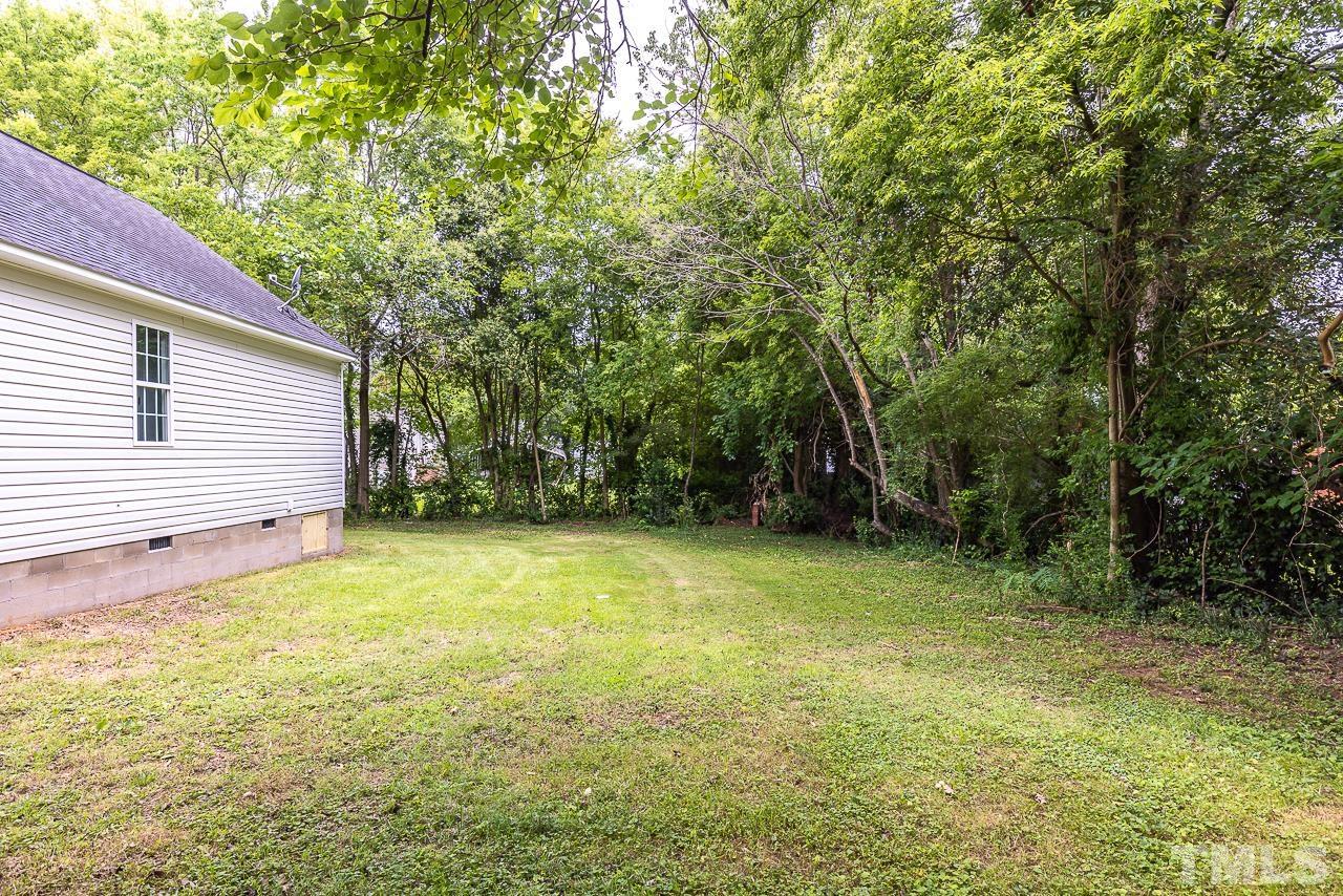 704 Hartford Road Raleigh, NC 27610 - Photo 26 of 29 a view of a backyard