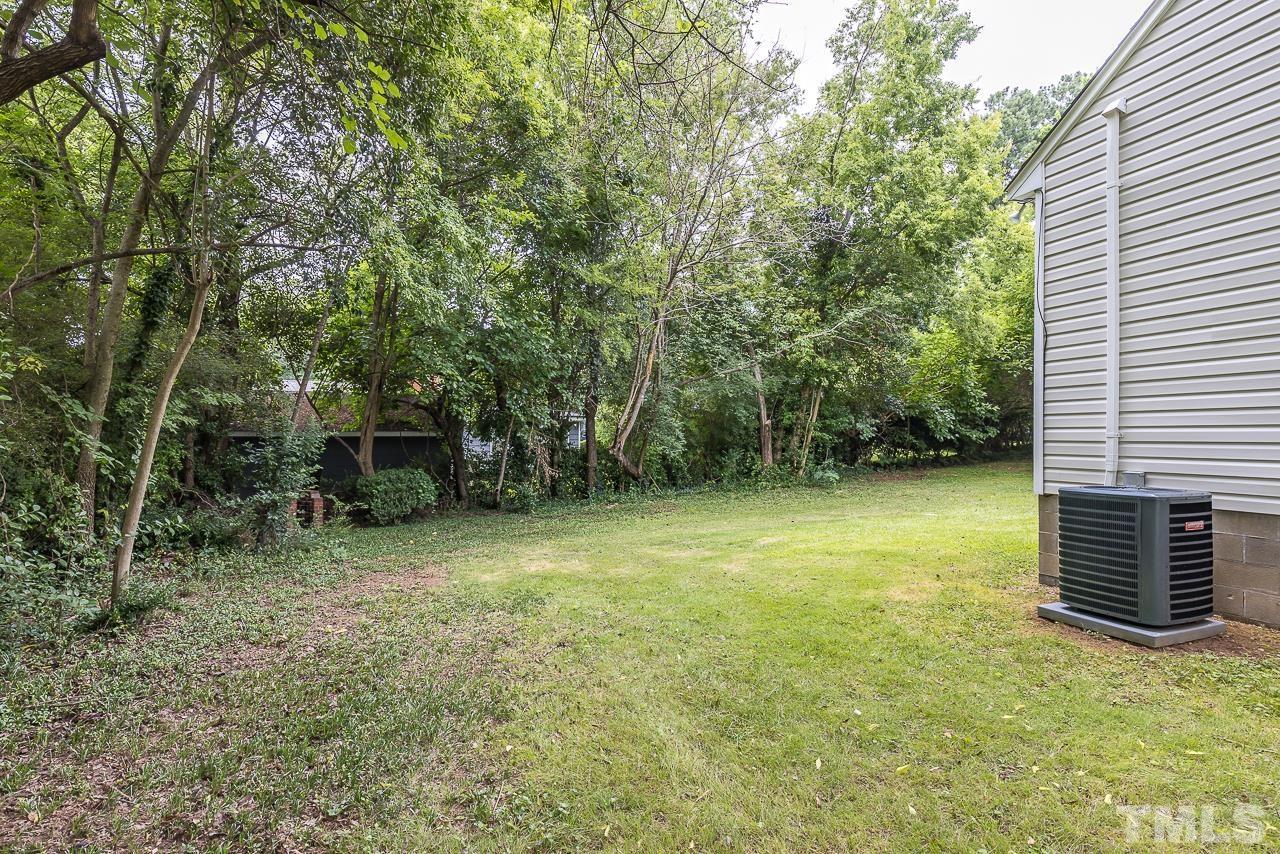 704 Hartford Road Raleigh, NC 27610 - Photo 28 of 29 a view of a backyard