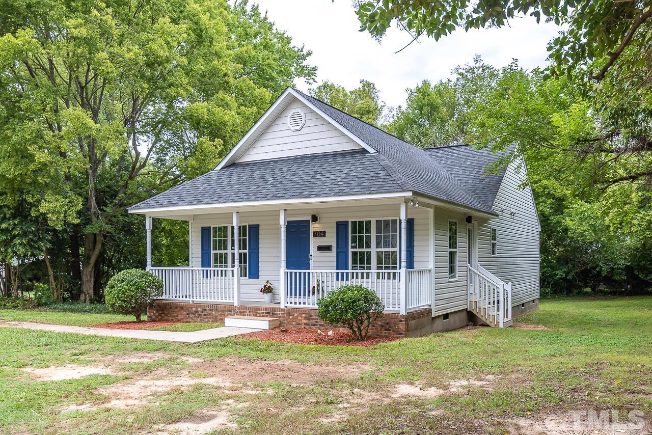 704 Hartford Road Raleigh, NC 27610 - Photo 3 of 29 a view of a house with a yard