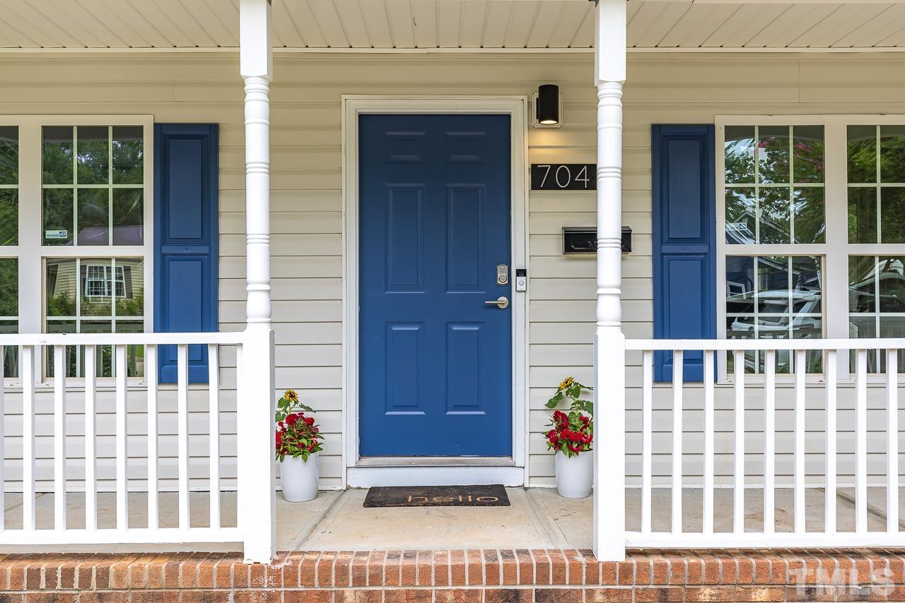 704 Hartford Road Raleigh, NC 27610 - Photo 5 of 29 a view of front door of house with a window