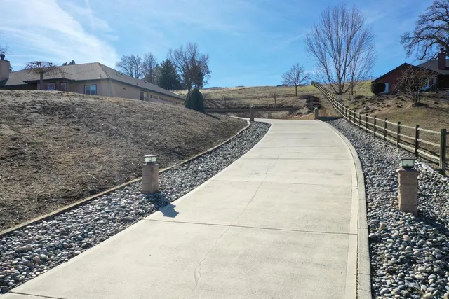 a view of a backyard of the house