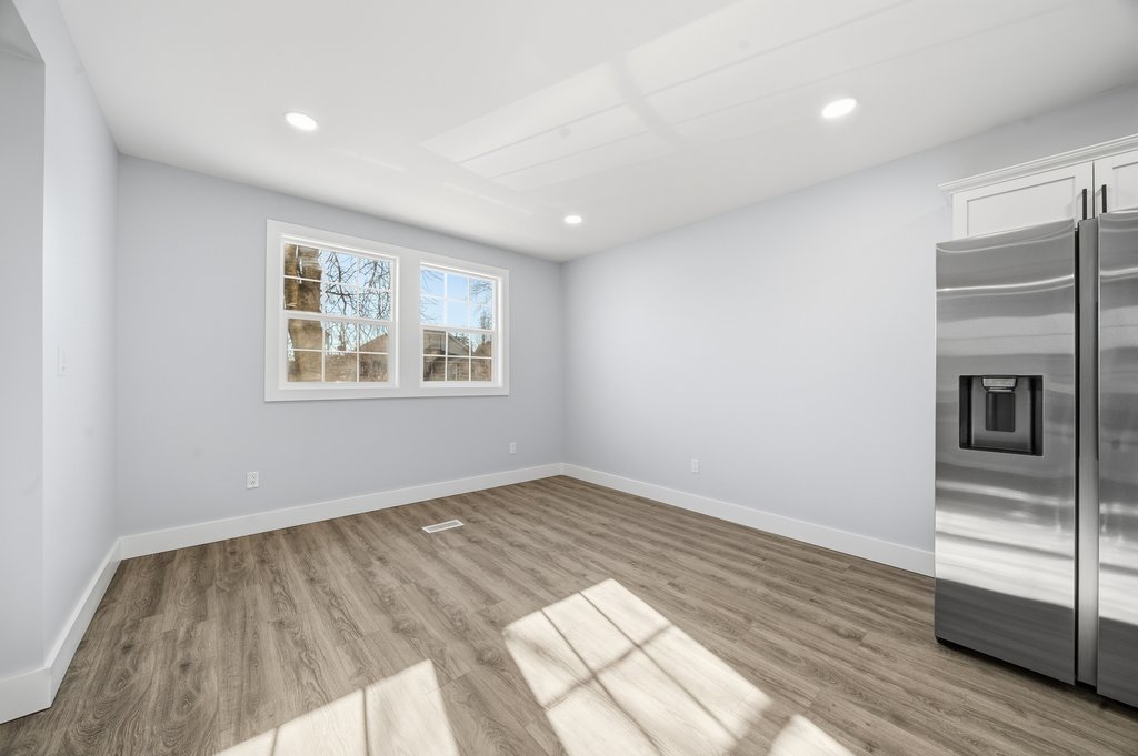 2112 Market Street Blue Island, IL 60406 - Photo 12 of 55 a view of wooden floor cabinets and windows in a room