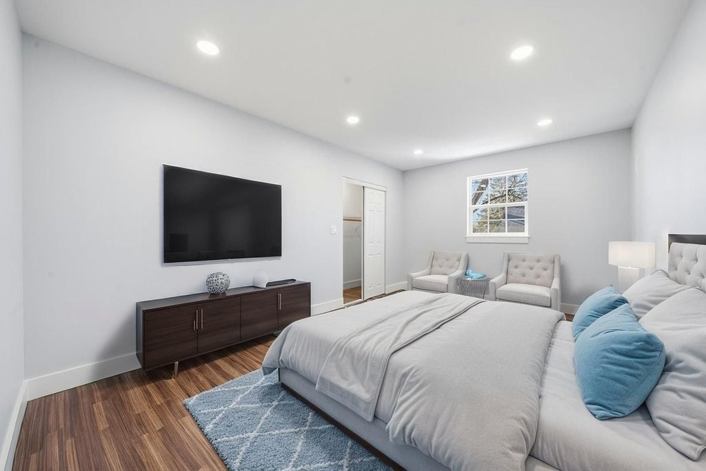 2112 Market Street Blue Island, IL 60406 - Photo 24 of 55 a bedroom with a bed and a flat screen tv