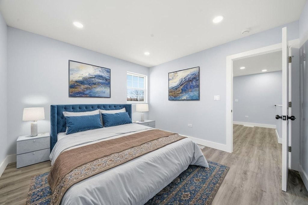2112 Market Street Blue Island, IL 60406 - Photo 28 of 55 a bedroom with a bed and a painting on the wall