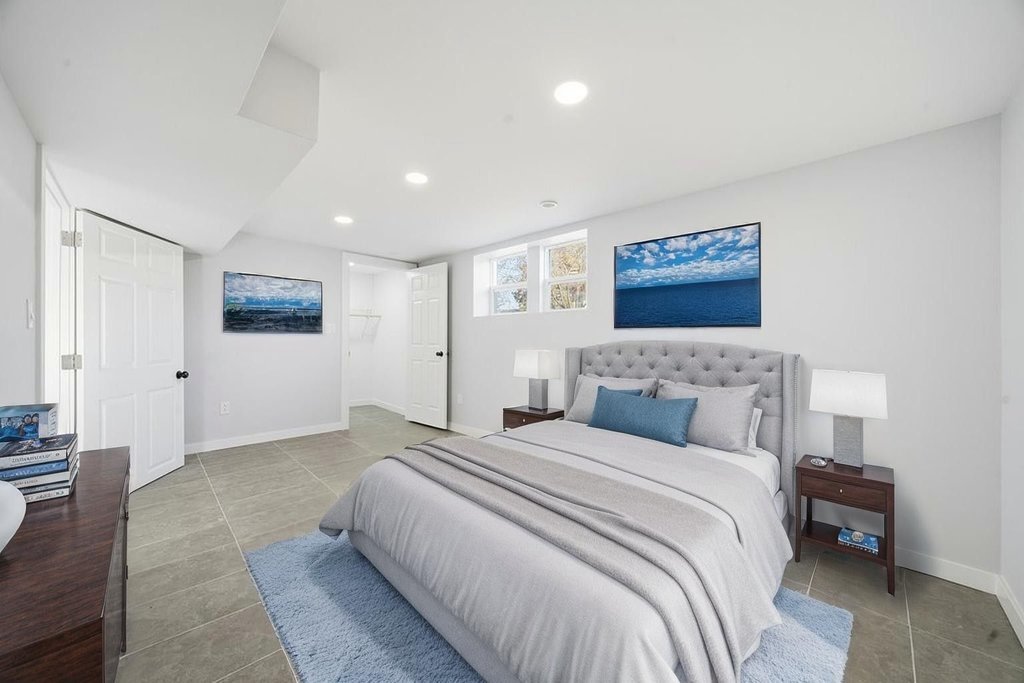 2112 Market Street Blue Island, IL 60406 - Photo 33 of 55 a spacious bedroom with a bed and a painting on the wall