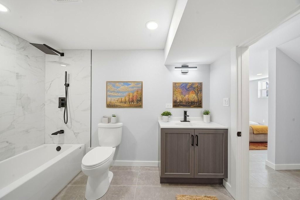 2112 Market Street Blue Island, IL 60406 - Photo 37 of 55 a bathroom with a sink a toilet and shower