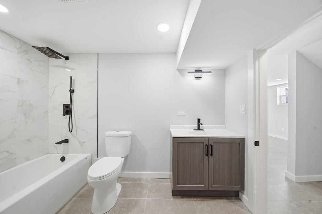 2112 Market Street Blue Island, IL 60406 - Photo 38 of 55 a bathroom with a sink a toilet and shower