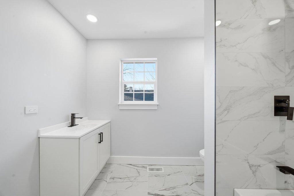 2112 Market Street Blue Island, IL 60406 - Photo 41 of 55 a bathroom with a sink a window and shower