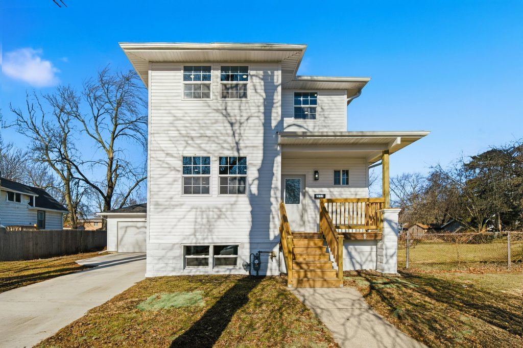 2112 Market Street Blue Island, IL 60406 - Photo 45 of 55 a front view of a house with garden