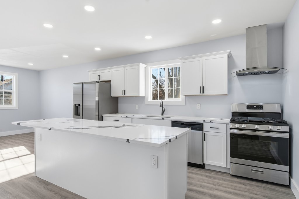 2112 Market Street Blue Island, IL 60406 - Photo 6 of 55 a kitchen with stainless steel appliances granite countertop a stove a sink and a refrigerator