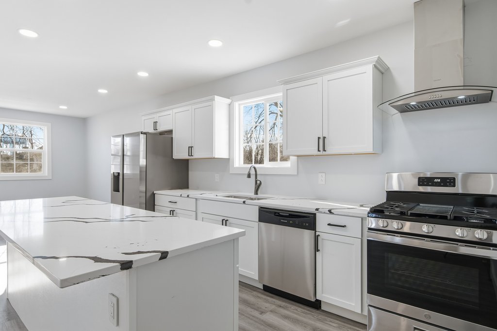 2112 Market Street Blue Island, IL 60406 - Photo 8 of 55 a kitchen with stainless steel appliances granite countertop a sink stove and refrigerator