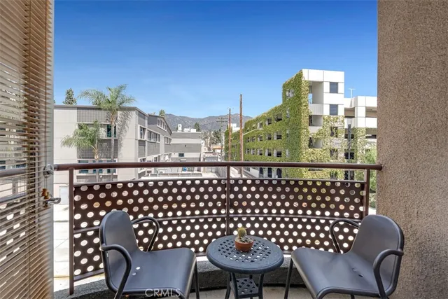 a spacious bedroom with a bed and a window