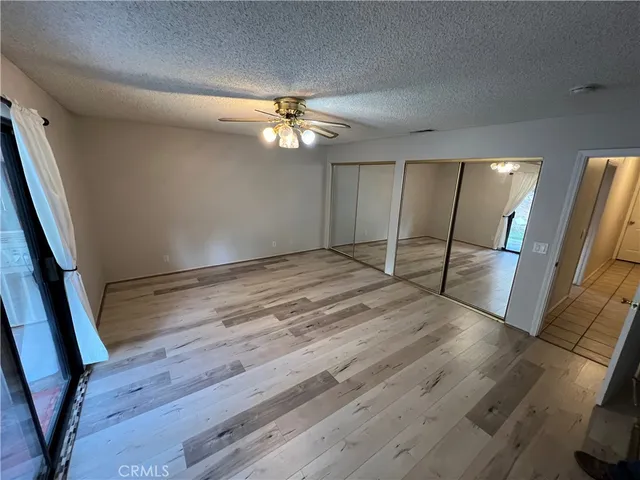 a bathroom with a sink a large mirror and a vanity