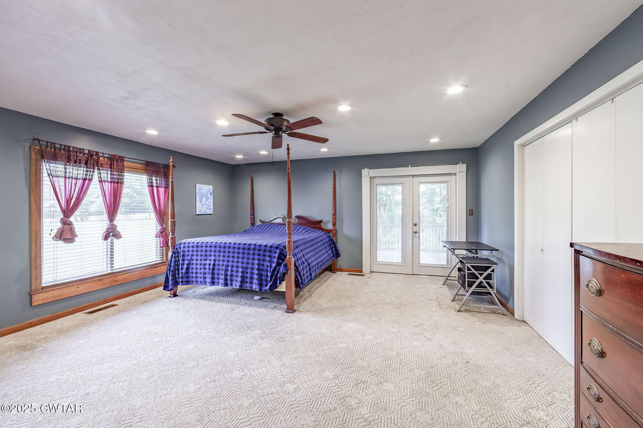 499 Diamond Grove Road Beech Bluff, TN 38313 - Photo 11 of 28 a spacious bedroom with a bed and large windows