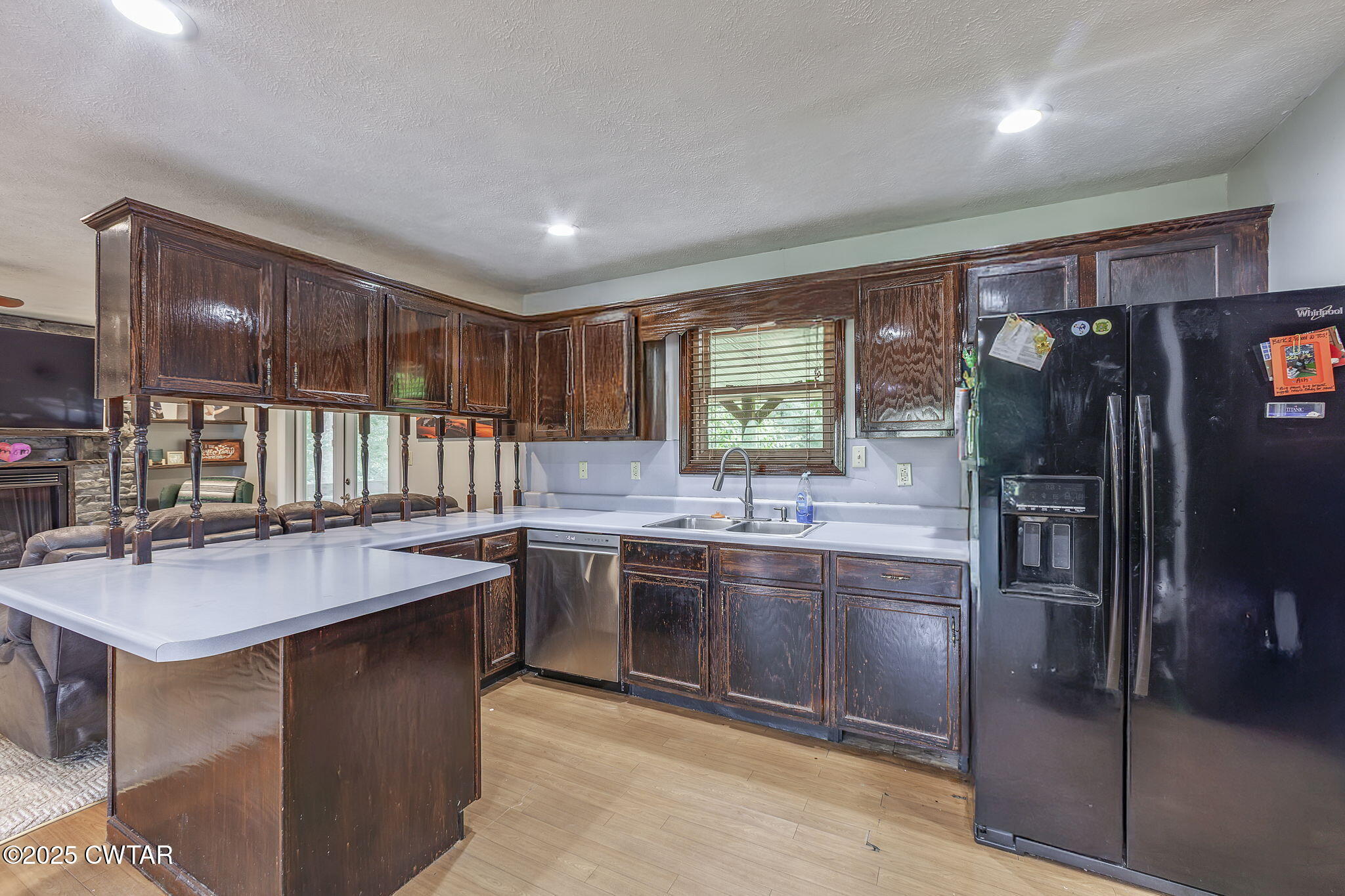 499 Diamond Grove Road Beech Bluff, TN 38313 - Photo 18 of 28 a kitchen with stainless steel appliances granite countertop a sink stove and refrigerator