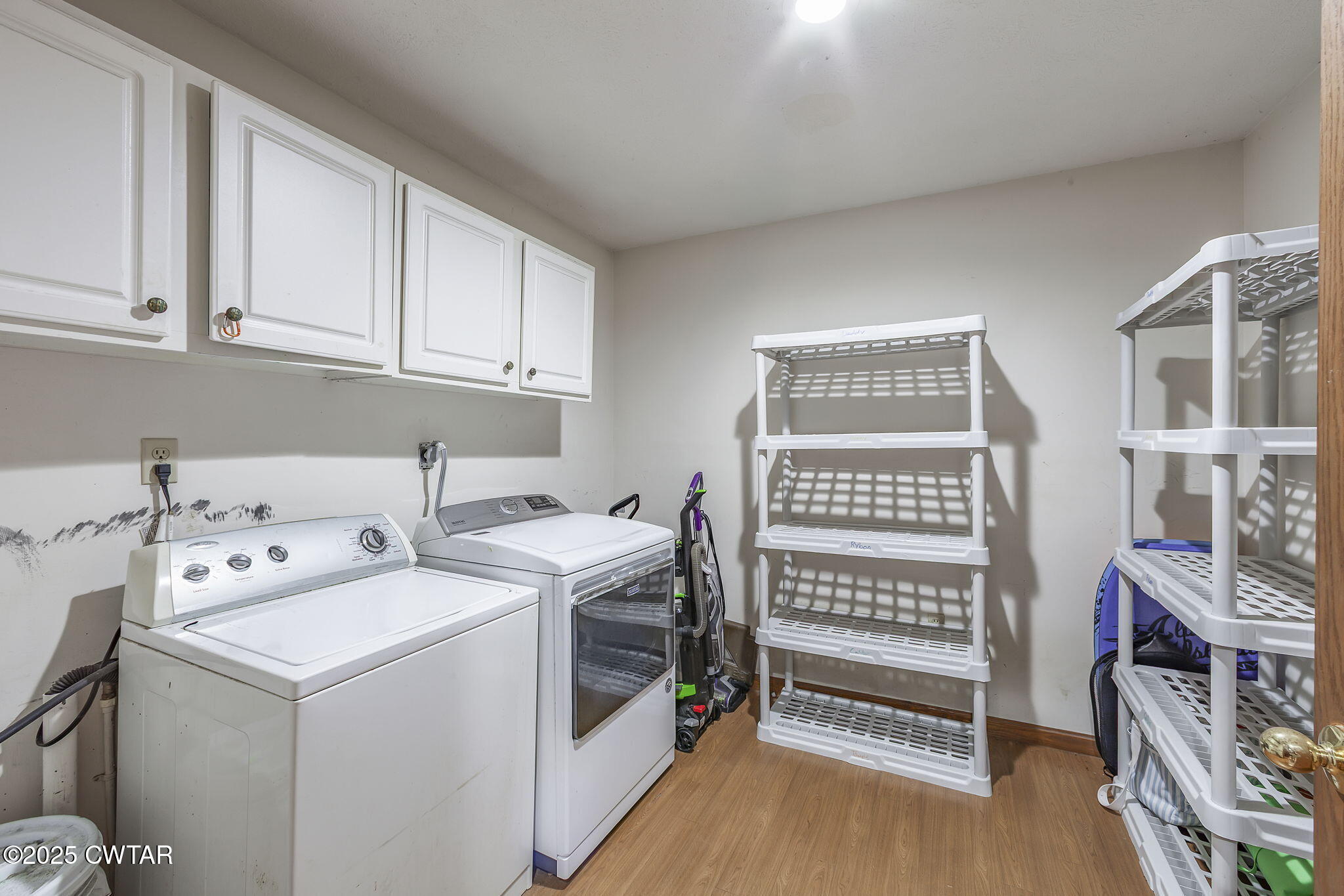 499 Diamond Grove Road Beech Bluff, TN 38313 - Photo 19 of 28 a utility room with dryer and washer